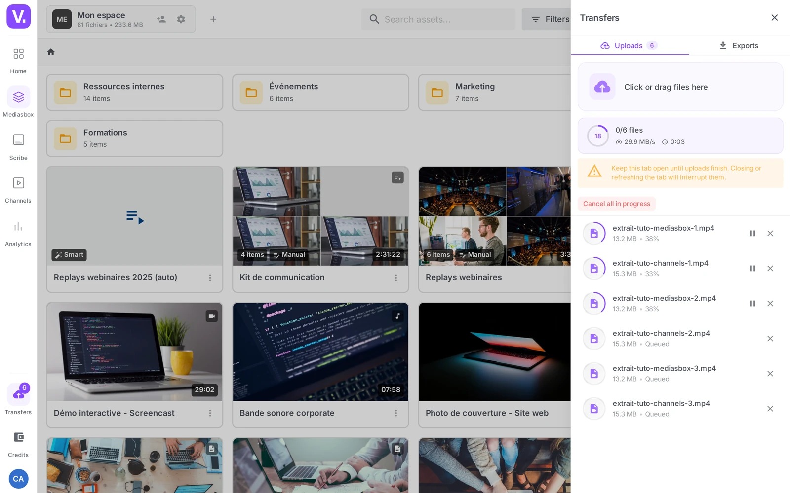 the uploads panel with several files in progress and queued
